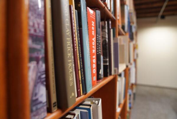 Close up photograph of a shelf of books